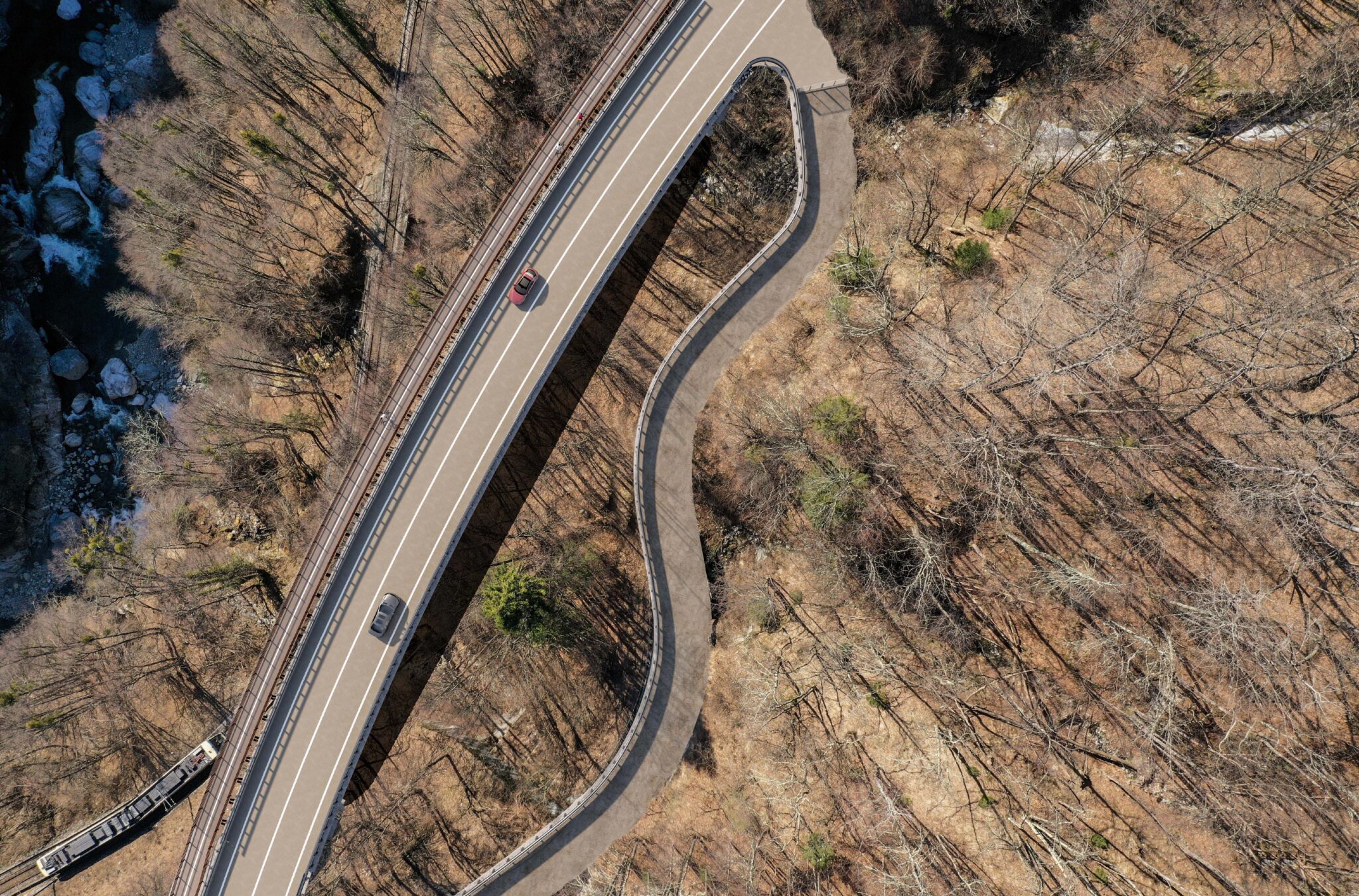 State Road, Val Vigezzo. Aerial view of a road segment immersed in a mountainous forest landscape, with two cars traveling on an elevated viaduct and a new road below following the natural contours of the terrain, near a railway line visible in the lower left corner.