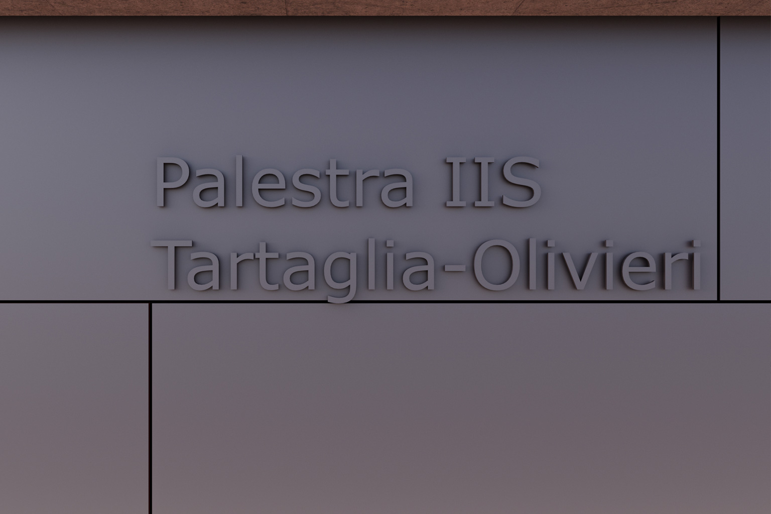 Palestra IIS Tartaglia-Olivieri. Detail of the “Palestra IIS Tartaglia-Olivieri” sign engraved on metal façade panels, part of the new school building.