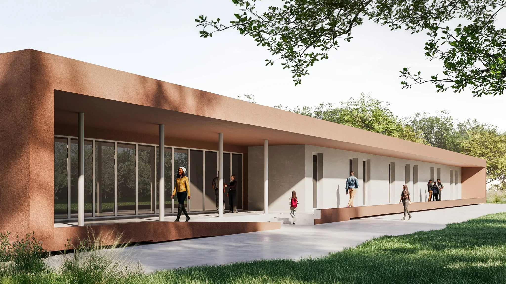 Render architettonico della Nuova casa dell'Accoglienza di via Corridoni a Brescia. Un edificio moderno a un piano con copertura piana e profonda pensilina, caratterizzato da una facciata in tonalità terracotta e ampie vetrate. Una sequenza di colonne sottili sostiene il portico, mentre alcune persone camminano o sostano lungo il percorso esterno. L’edificio è immerso nel verde, con alberi e prato circostante in una giornata di sole.